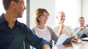 people discussing how to be a leader that everyone admires at work