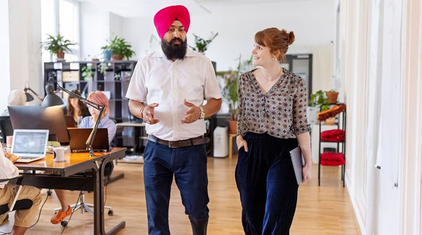 People discussing why inclusion at work is critical for employee engagement