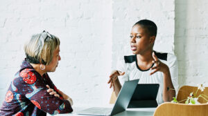 People discussing organizational change consulting services and organizational transformation services from the Center for Creative Leadership (CCL)