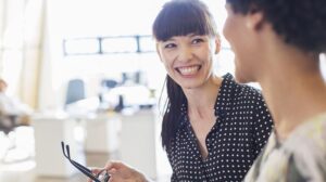 People discussing the 6 essential coaching principles and strategies that leaders should know