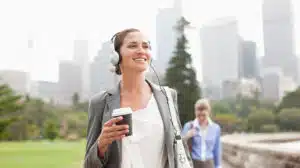 woman walking through the park, avoiding stress and burnout by avoiding rumination