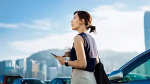 image of a business woman looking into distance thinking about the leadership profile of the future